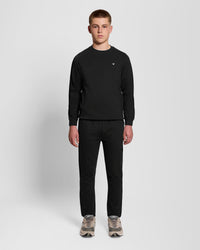 Man wears Sports Lightweight Joggers in Jet Black