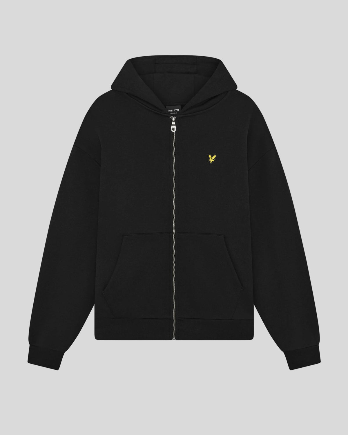 Man wears Heavyweight Loopback Zip Hoodie in Jet Black