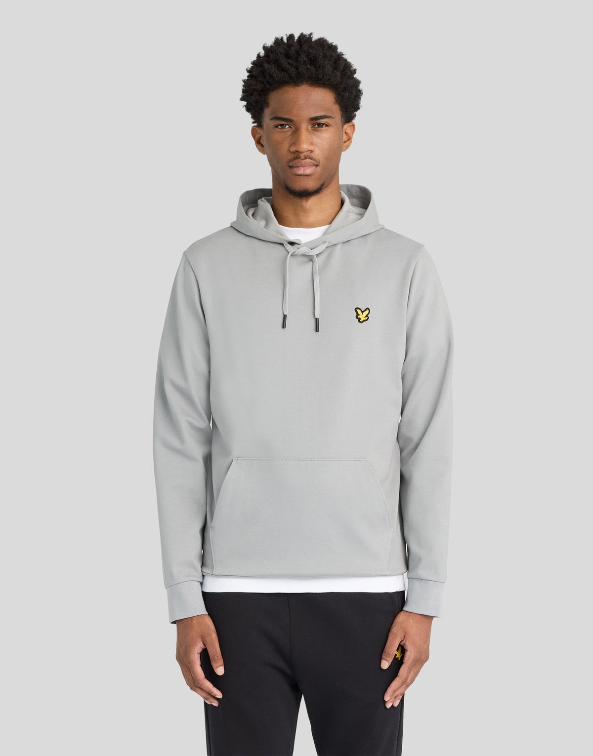 Man wears Sports Lightweight Hoodie in Ultimate Grey