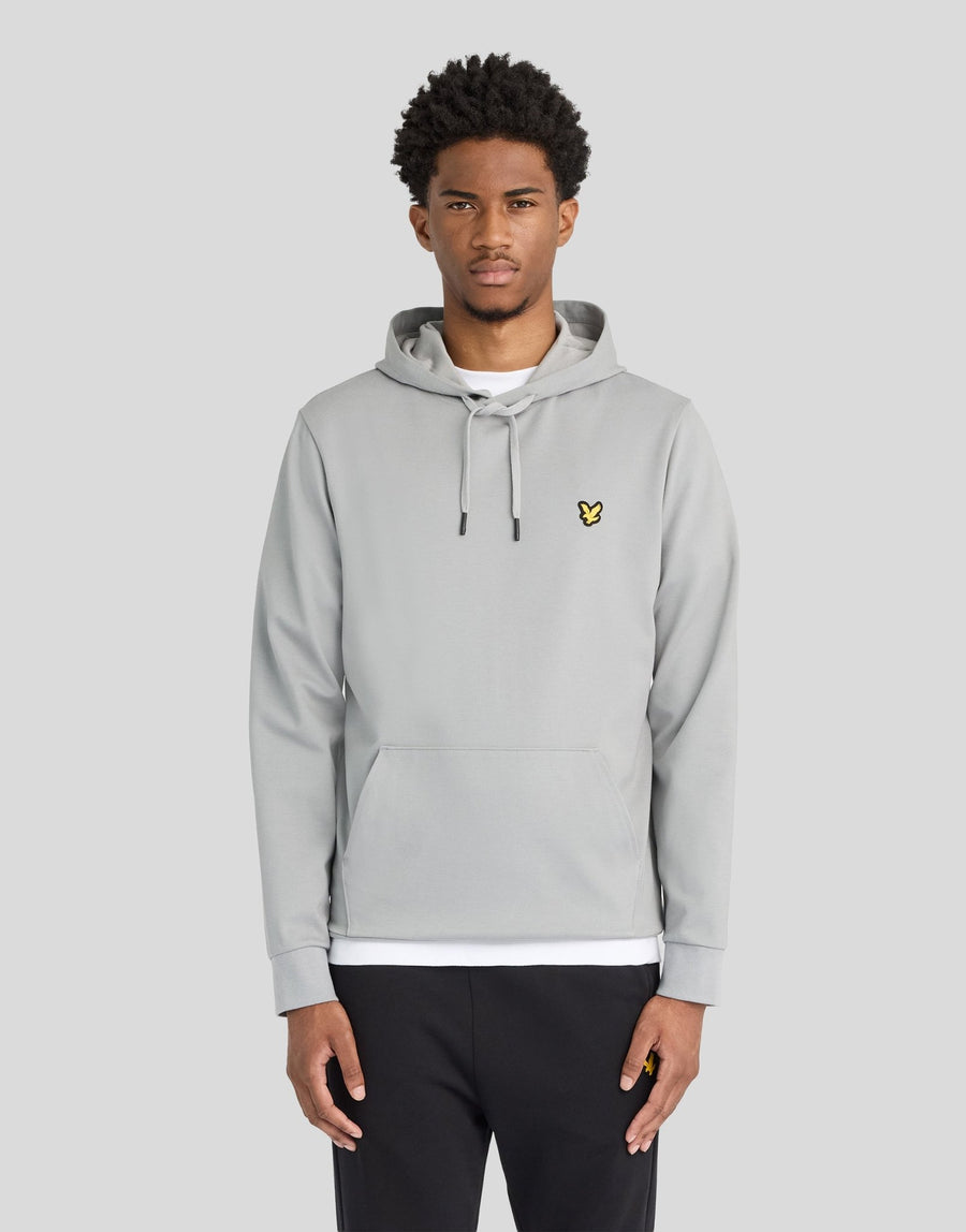 Man wears Sports Lightweight Hoodie in Ultimate Grey