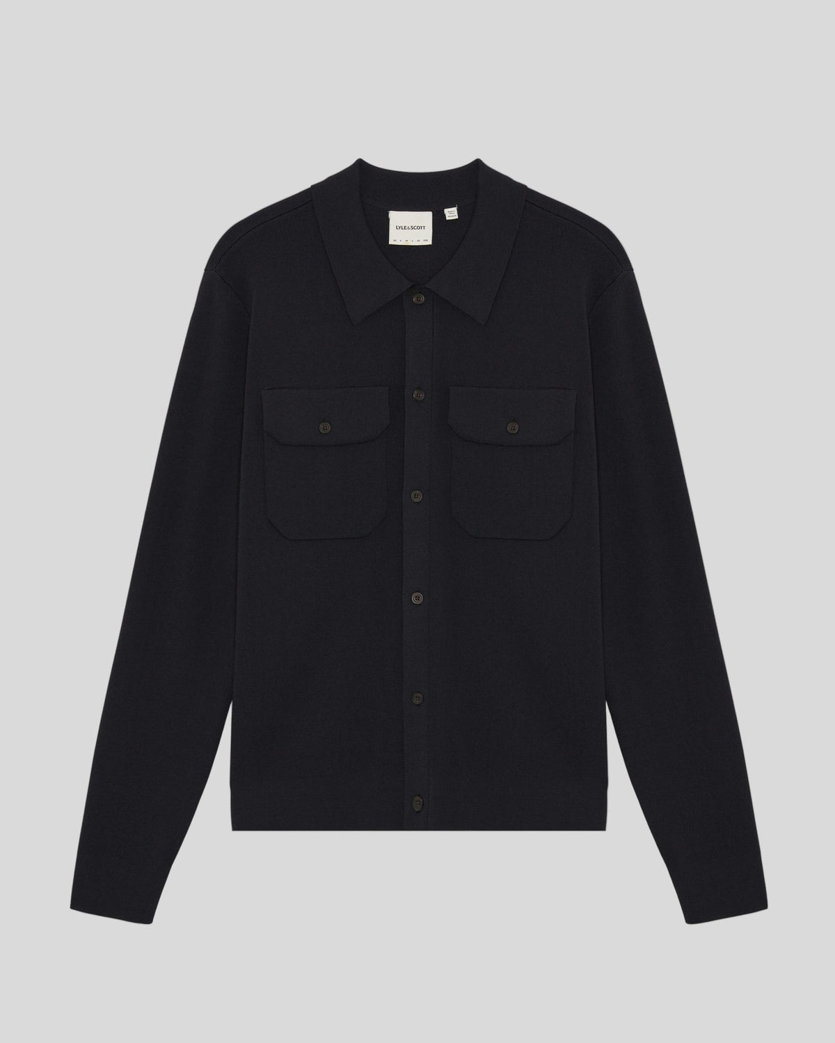 Man wears Utility Knit Overshirt in Lacquer