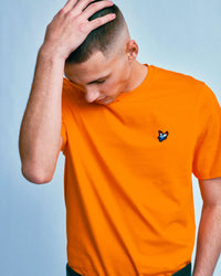 Man wearing Lyle & Scott Dutch Flag T-Shirt