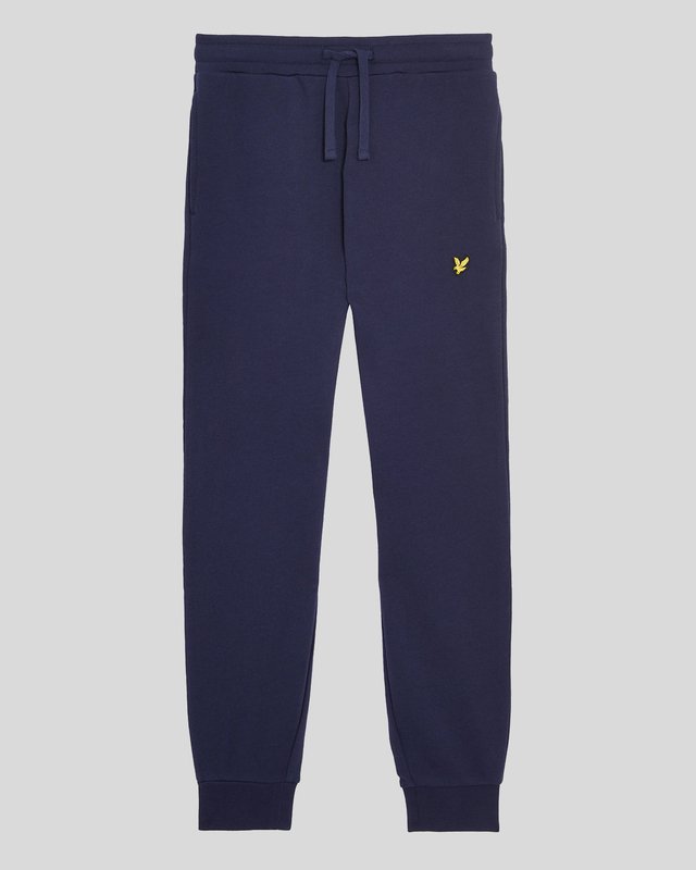 Ragazzo con pantaloni da jogging in cotone blu navy