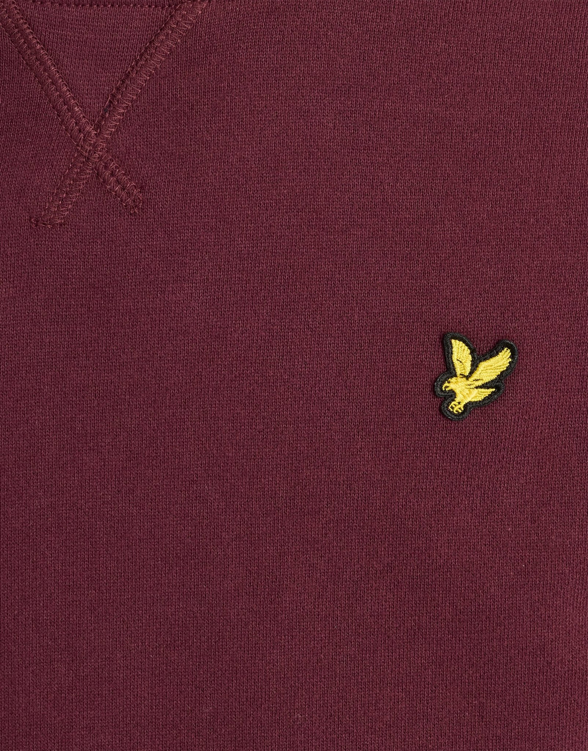 Garçon portant un sweat-shirt classique à col rond, couleur bordeaux