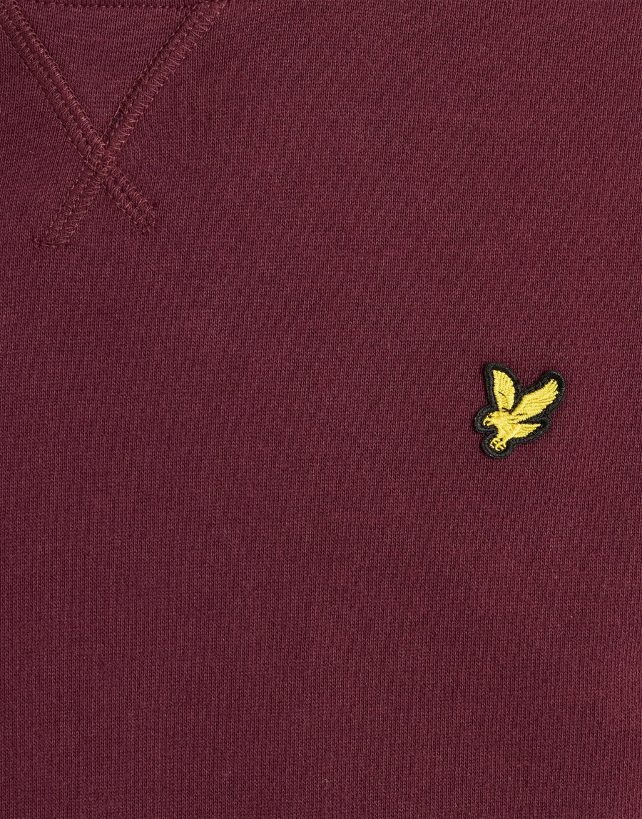 Garçon portant un sweat-shirt classique à col rond, couleur bordeaux