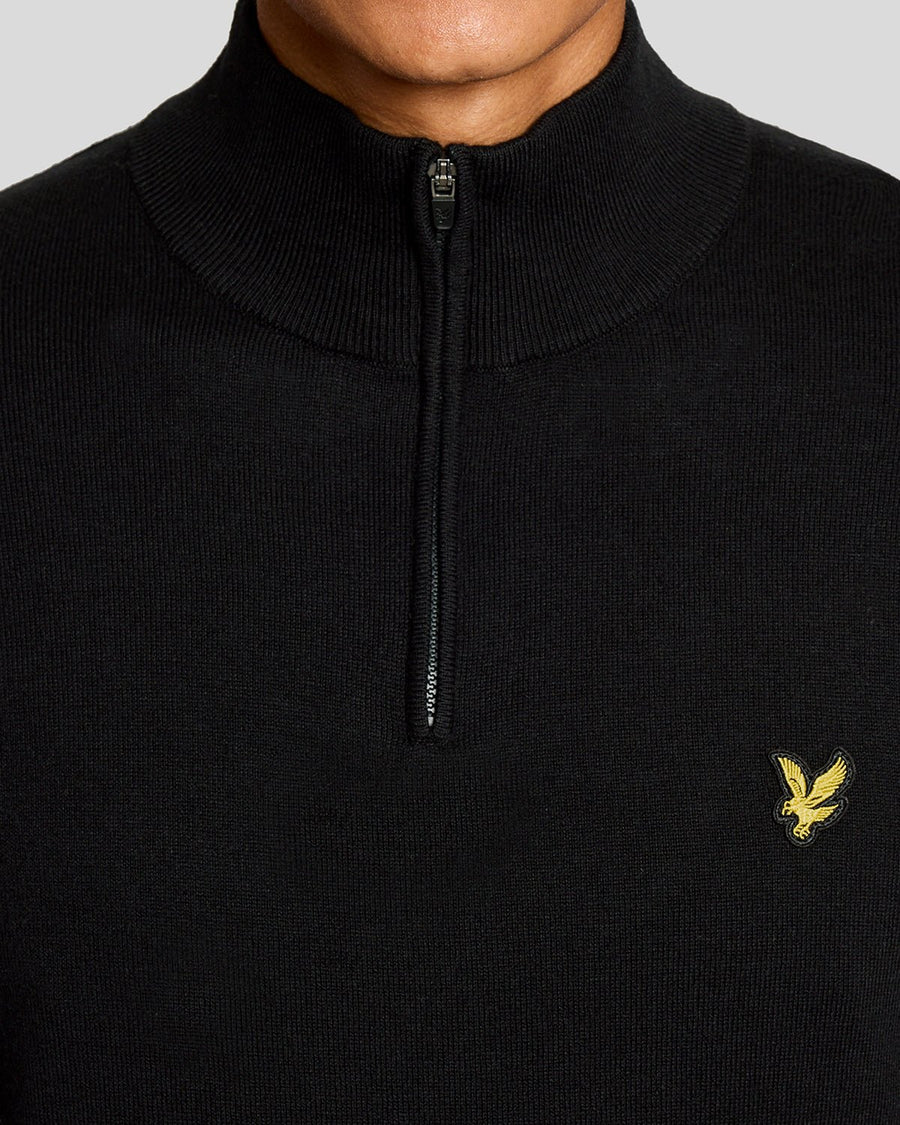 Hombre con jersey Performance con cremallera de 1/4 en negro azabache
