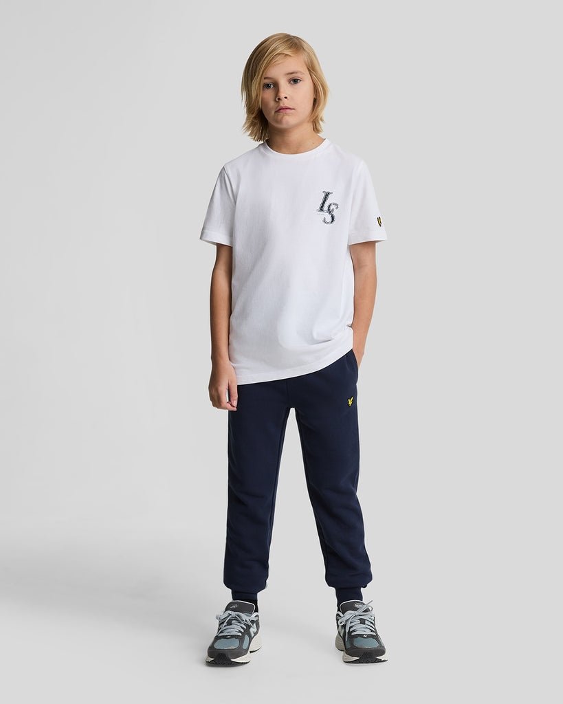 Ragazzo con pantaloni da jogging in cotone blu navy