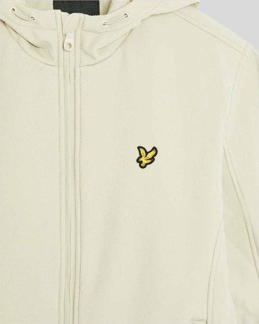 Man wears Fleece Lined Softshell Jacket in Grey Taupe