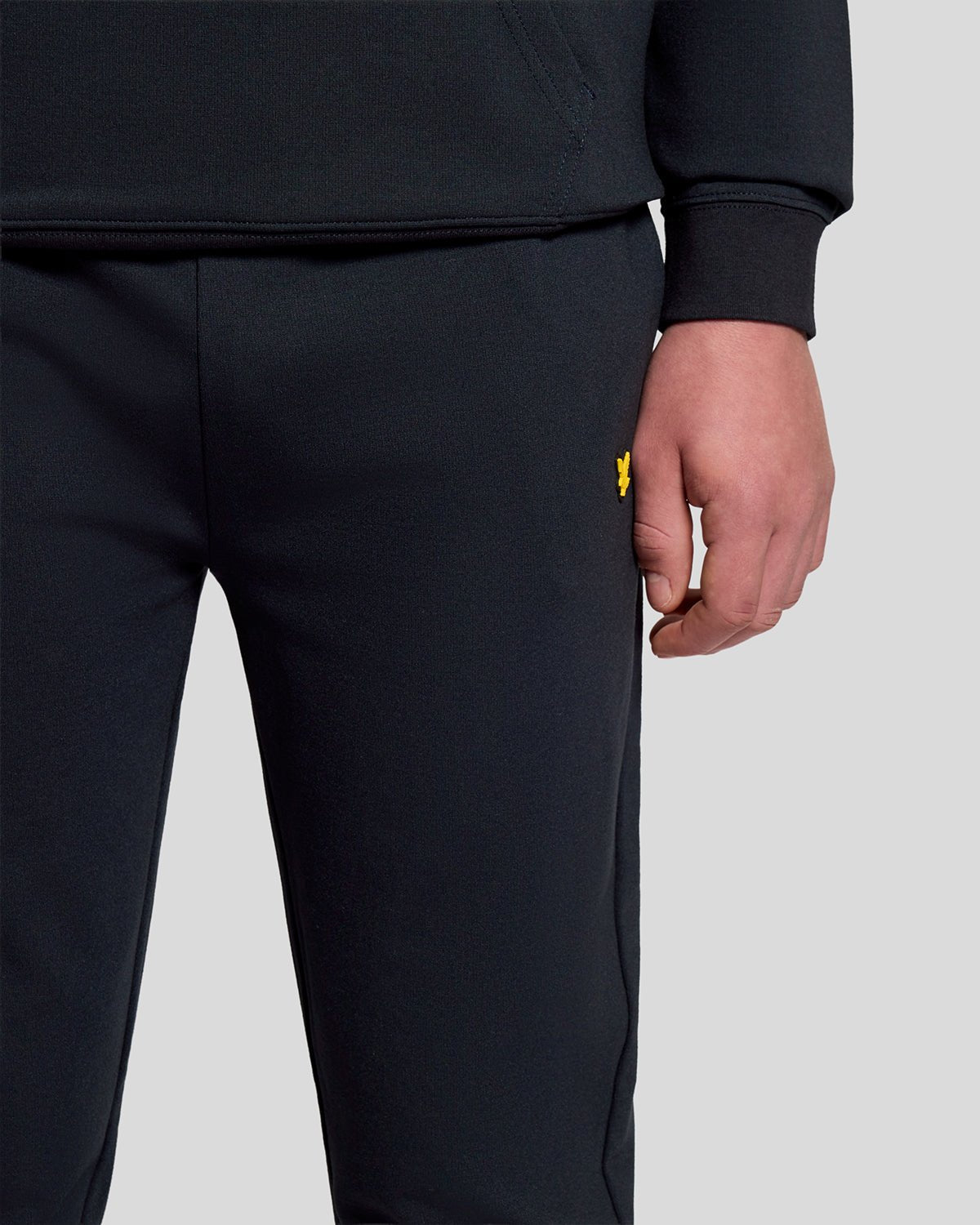 Man wears Sports Lightweight Joggers in Dark Navy