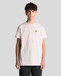 Man wears Cotton Crew Neck T-Shirt in Light Pink