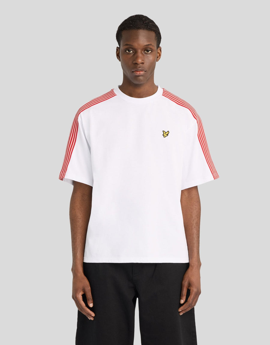 Man wears Stripe Taped Cotton T-Shirt in White