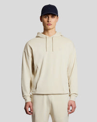 Man wears Relaxed Hoodie in Birch