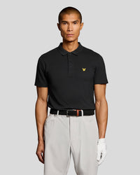 Man wears Technical Polo Shirt in Jet Black
