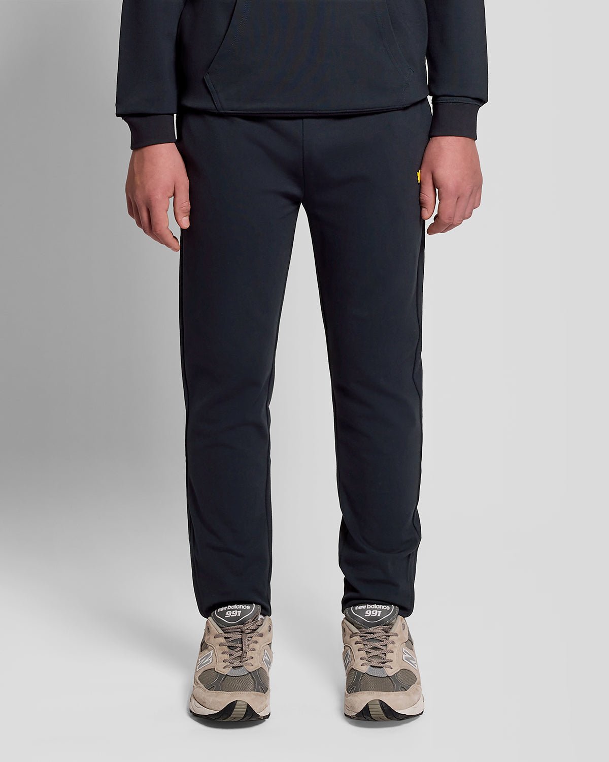 Man wears Sports Lightweight Joggers in Dark Navy