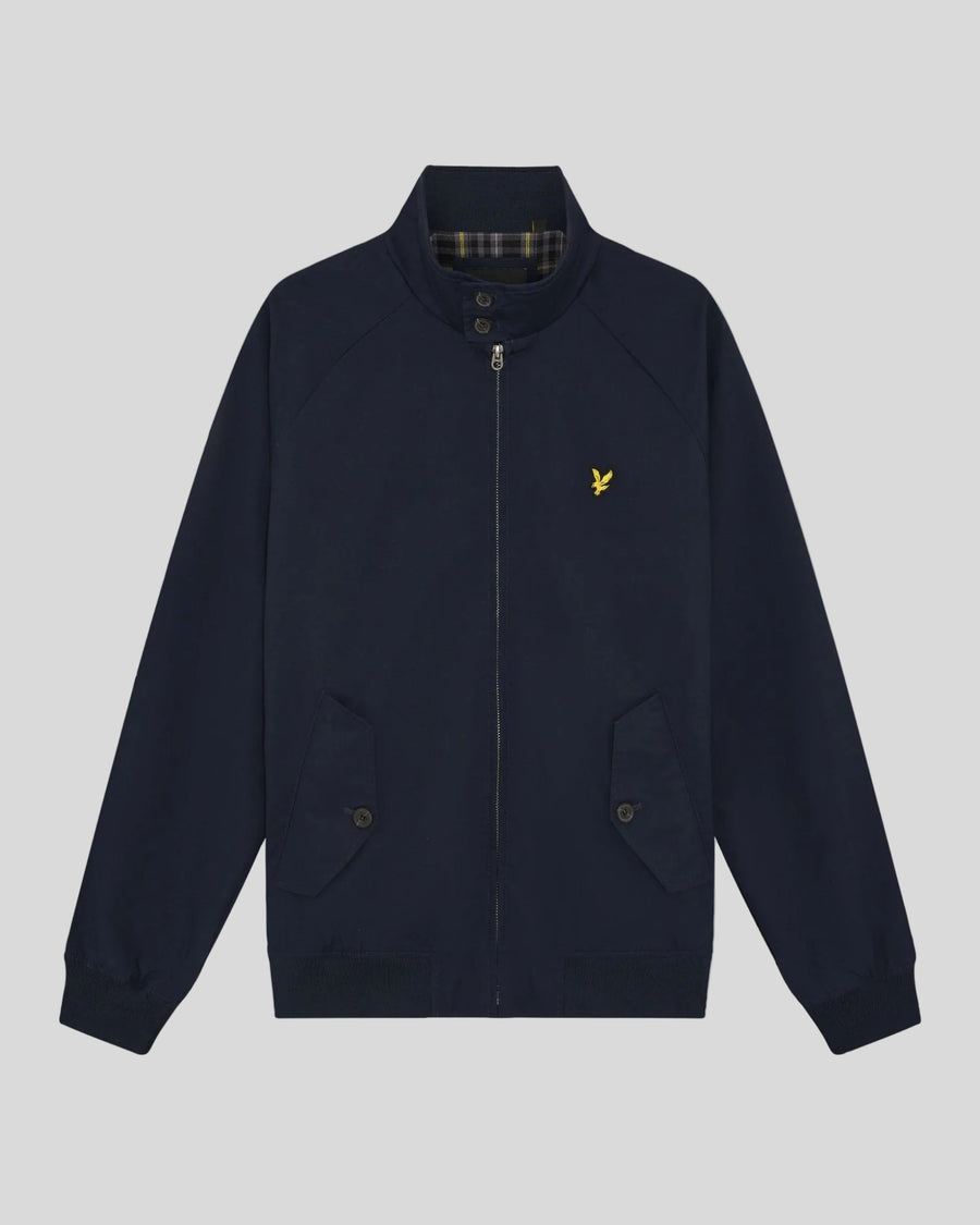 Man wears Cotton Harrington Jacket in Dark Navy
