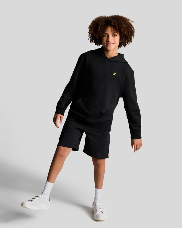 Garçon portant un sweat à capuche en coton Loopback, couleur noir de jais
