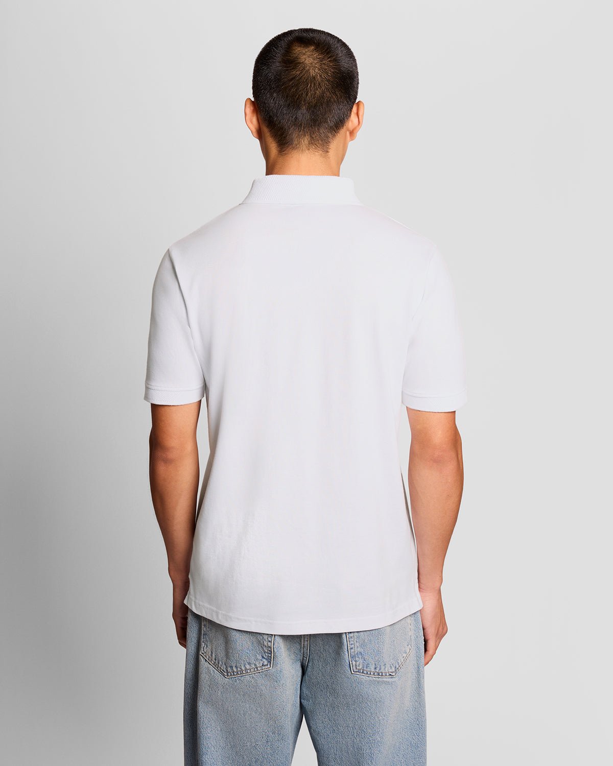 Uomo con polo a righe in jacquard, colore bianco