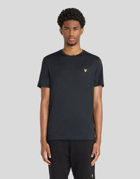 Man wears Sports Technical T-Shirt in Jet Black