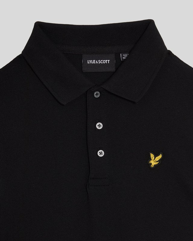 Garçon portant un polo en coton noir de jais
