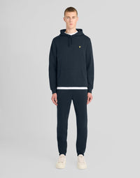 Man wears Everyday Cotton Joggers in Carbon