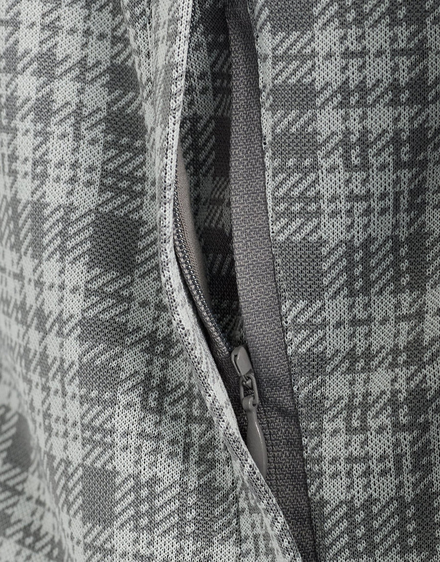 Man wears Hawick Cotton Check Track Jacket in Mid Grey Marl