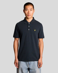 Man wears Cotton Polo Shirt in Graystone
