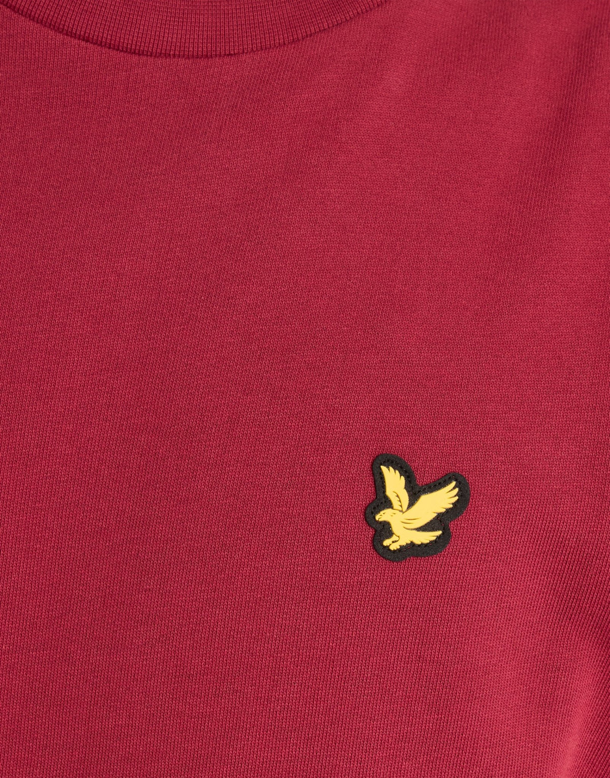 Man wears Sports Tape Crew Neck Sweatshirt in Plum