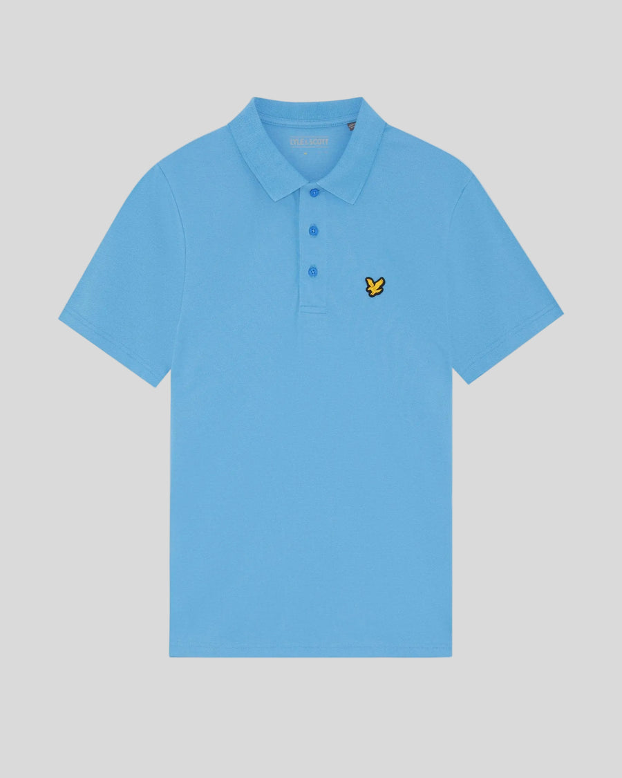 Un homme porte un polo technique de la marque Nitrogen