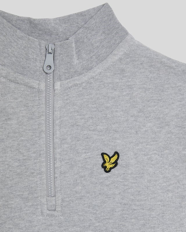 Ragazzo con maglione con zip a 1/4 in grigio chiaro melange