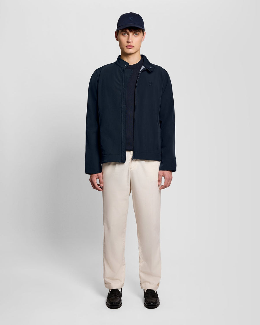 Man wears Lightweight Softshell Jacket in Carbon