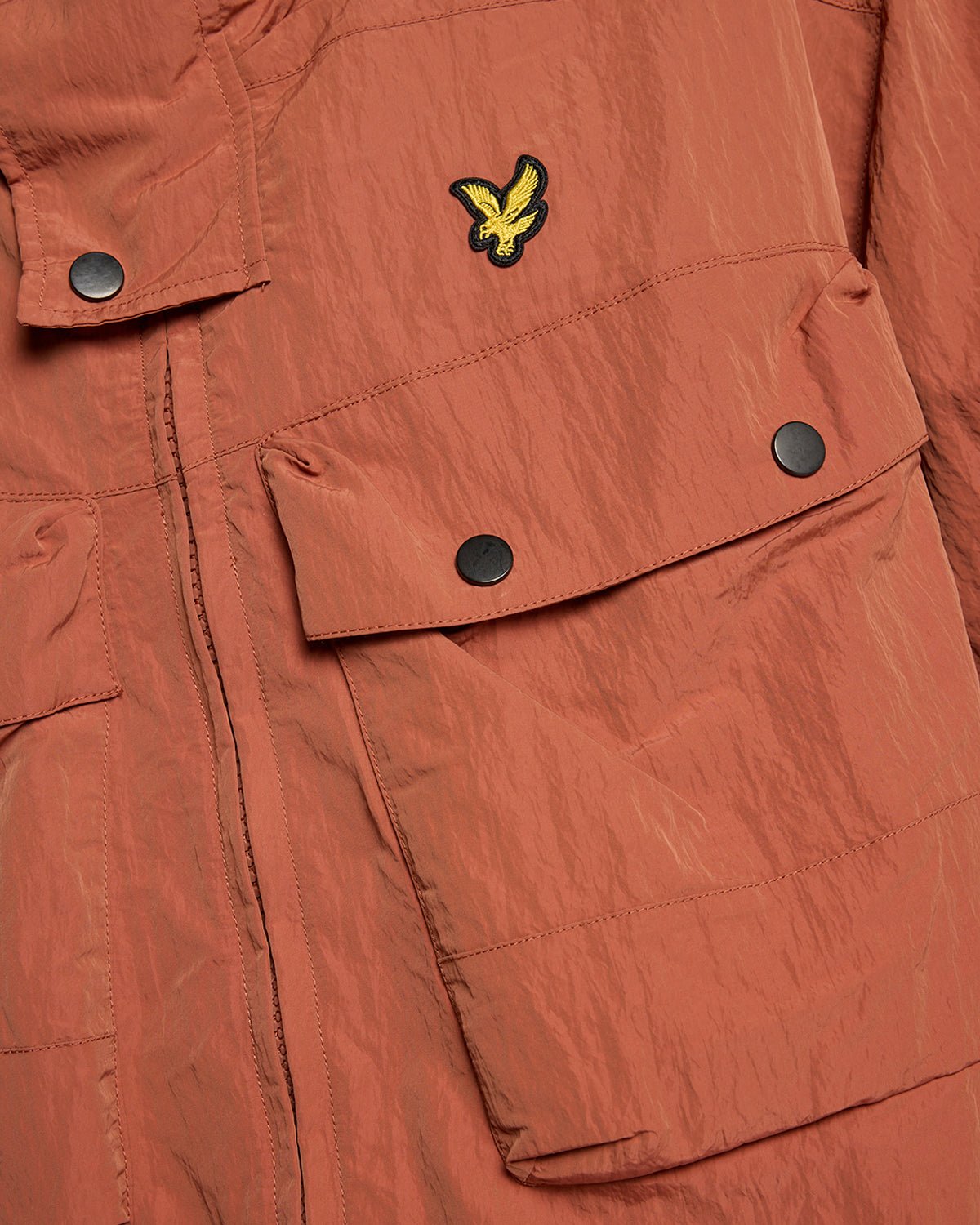 Man wears Water Resistant Guard Parka in Brick