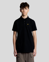 Man wears Sports Polo Shirt in Jet Black