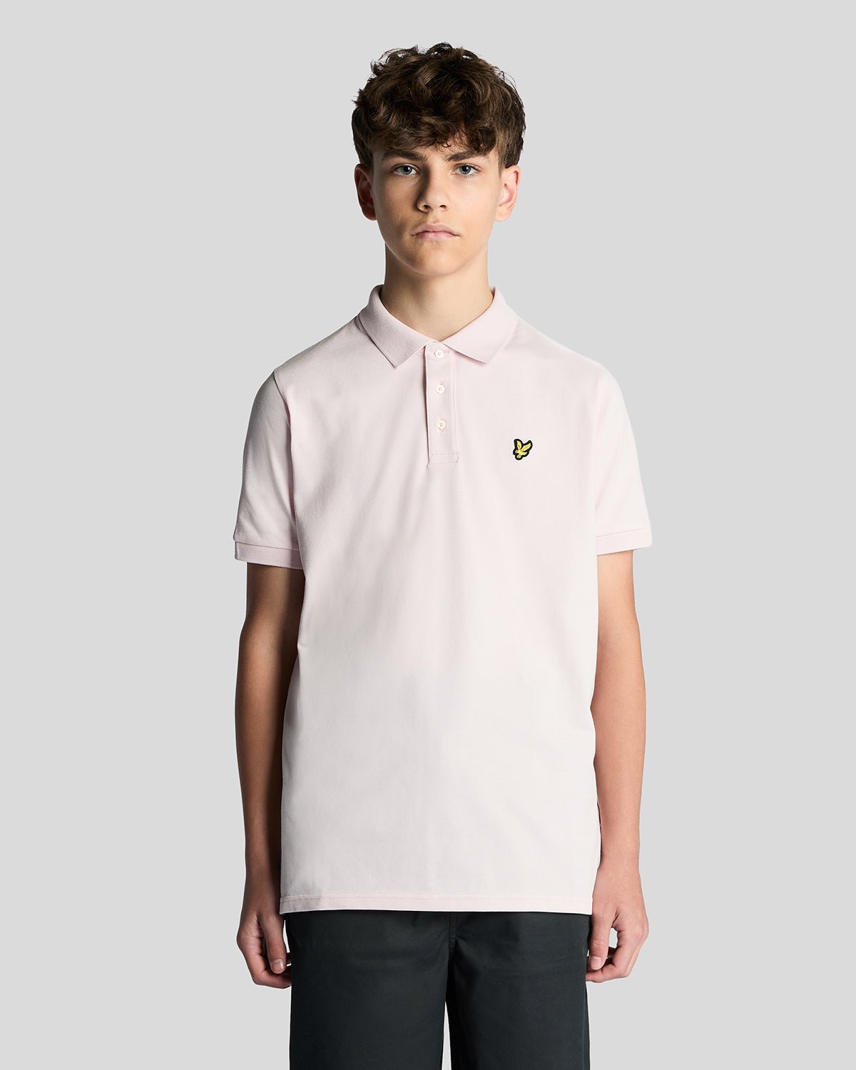 Uomo con polo in cotone rosa chiaro