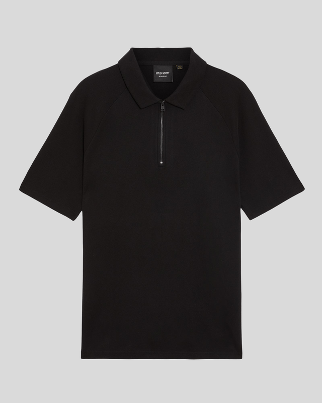 Man wears Interlock Zipped Polo Shirt in Jet Black