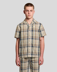 Man wears Short Sleeve Check Linen Blend Shirt in Herb Green
