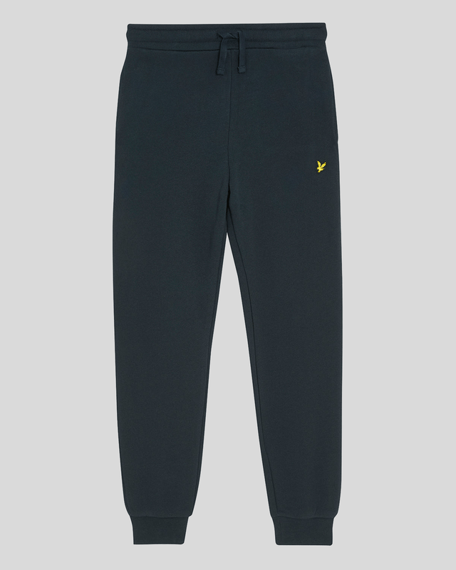 Pojke i joggingsbyxor med borstad baksida i mörk marinblå