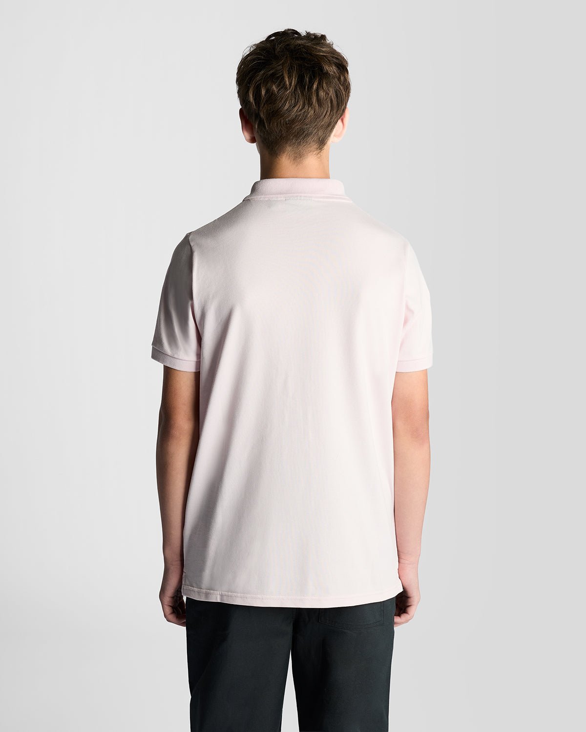 Uomo con polo in cotone rosa chiaro