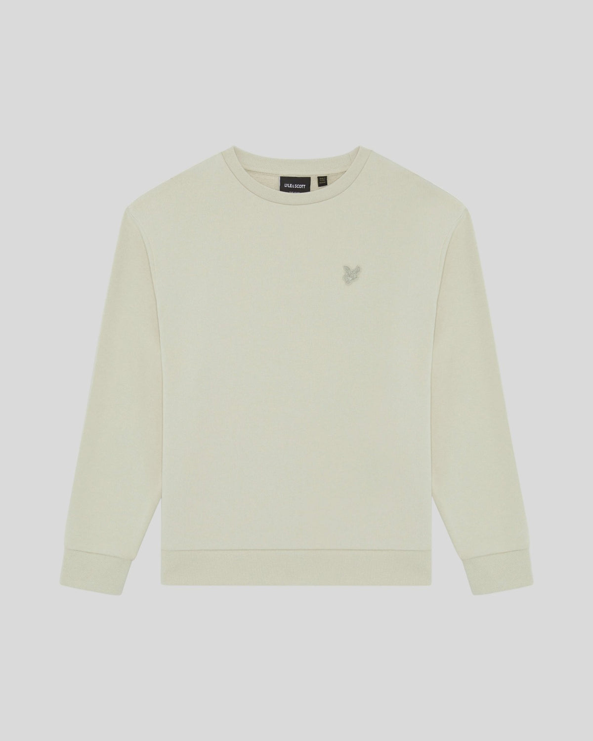 Un homme porte un sweat-shirt en coton épais couleur blé
