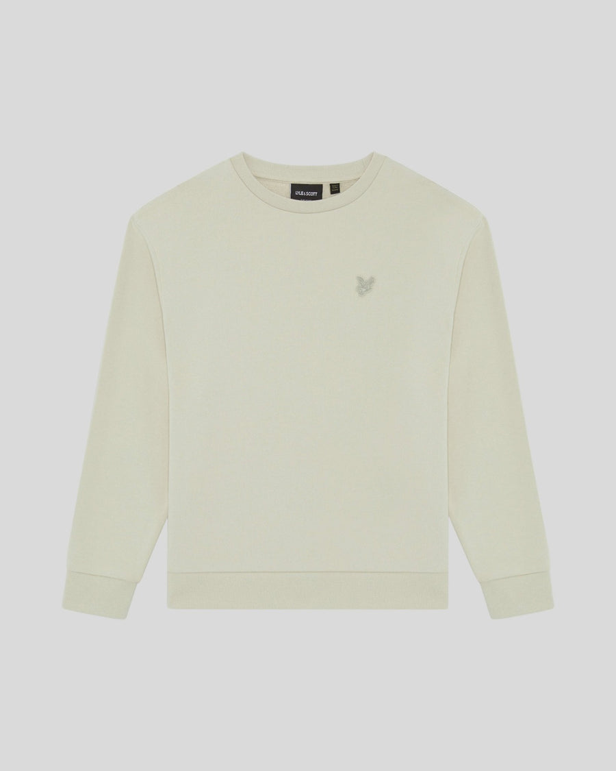 Un homme porte un sweat-shirt en coton épais couleur blé