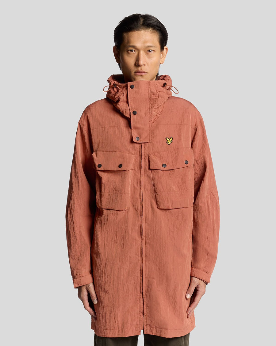 Man wears Water Resistant Guard Parka in Brick