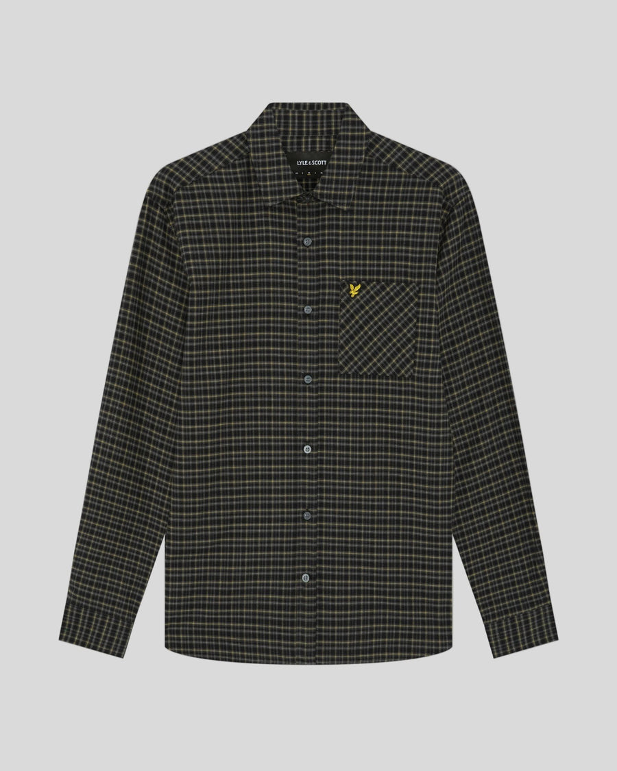 Man wears Tartan Flannel Shirt in Jet Black