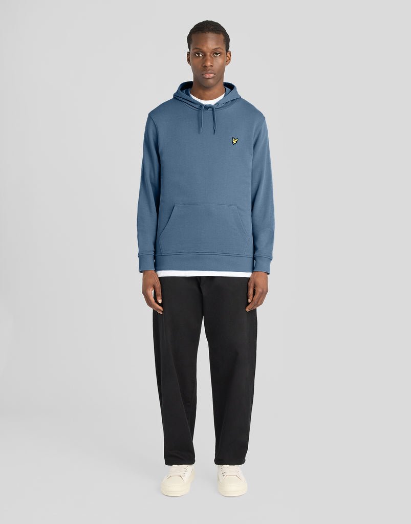 Man wears Everyday Loopback Cotton Hoodie in Ocean Sky