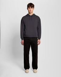 Man wears Relaxed Hoodie in Iron