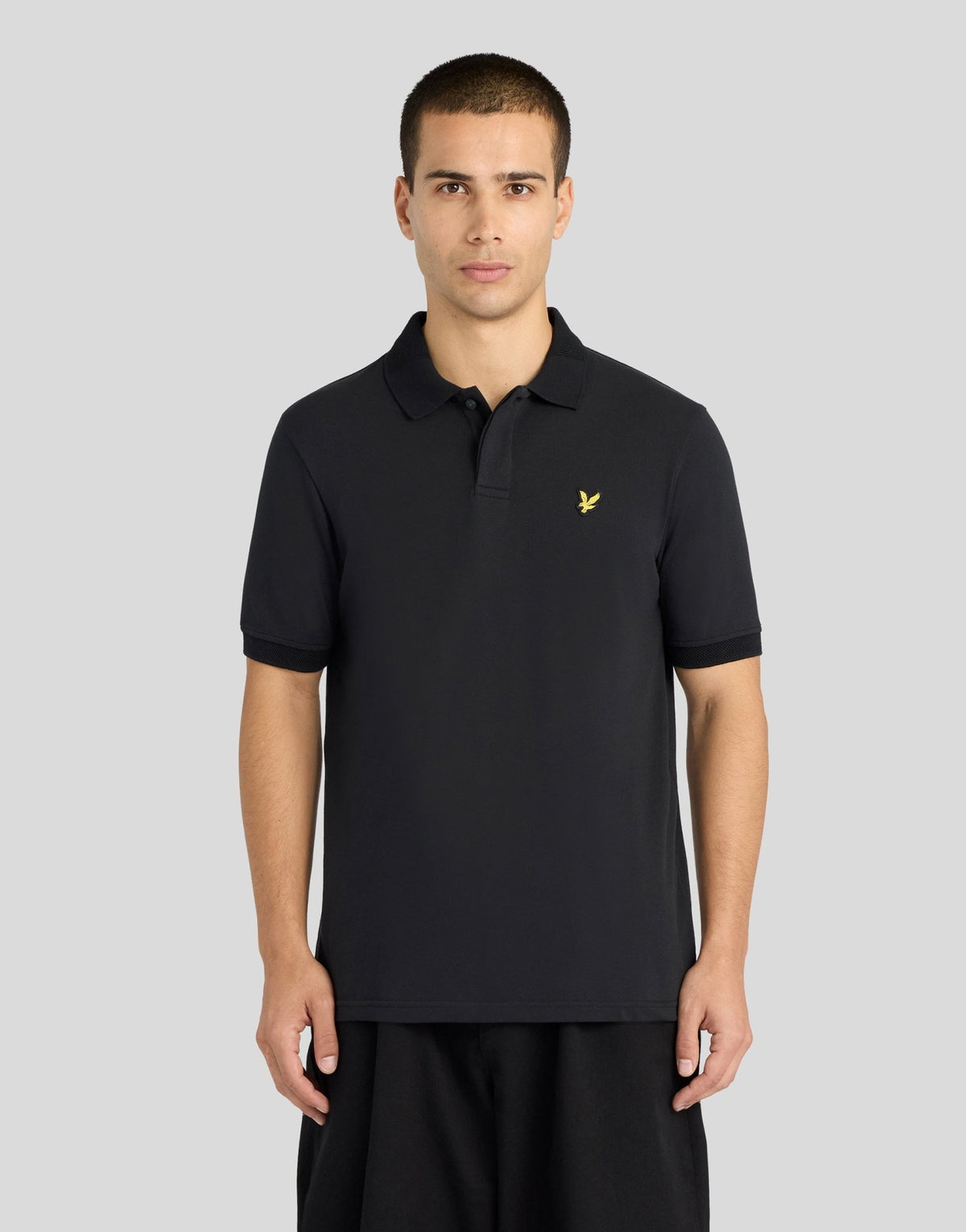 Man draagt een polo met jacquardrand in Jet Black