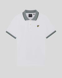 Man wears Birdseye Collar Polo Shirt in White/ Clover green
