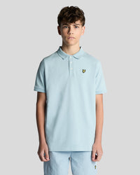 Man wears Cotton Polo Shirt in Opal Blue