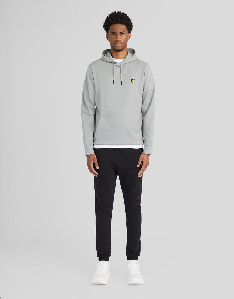 Man wears Sports Lightweight Hoodie in Ultimate Grey