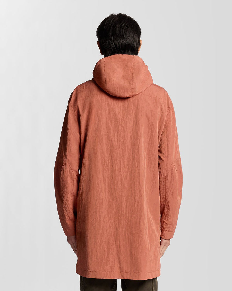Man wears Water Resistant Guard Parka in Brick