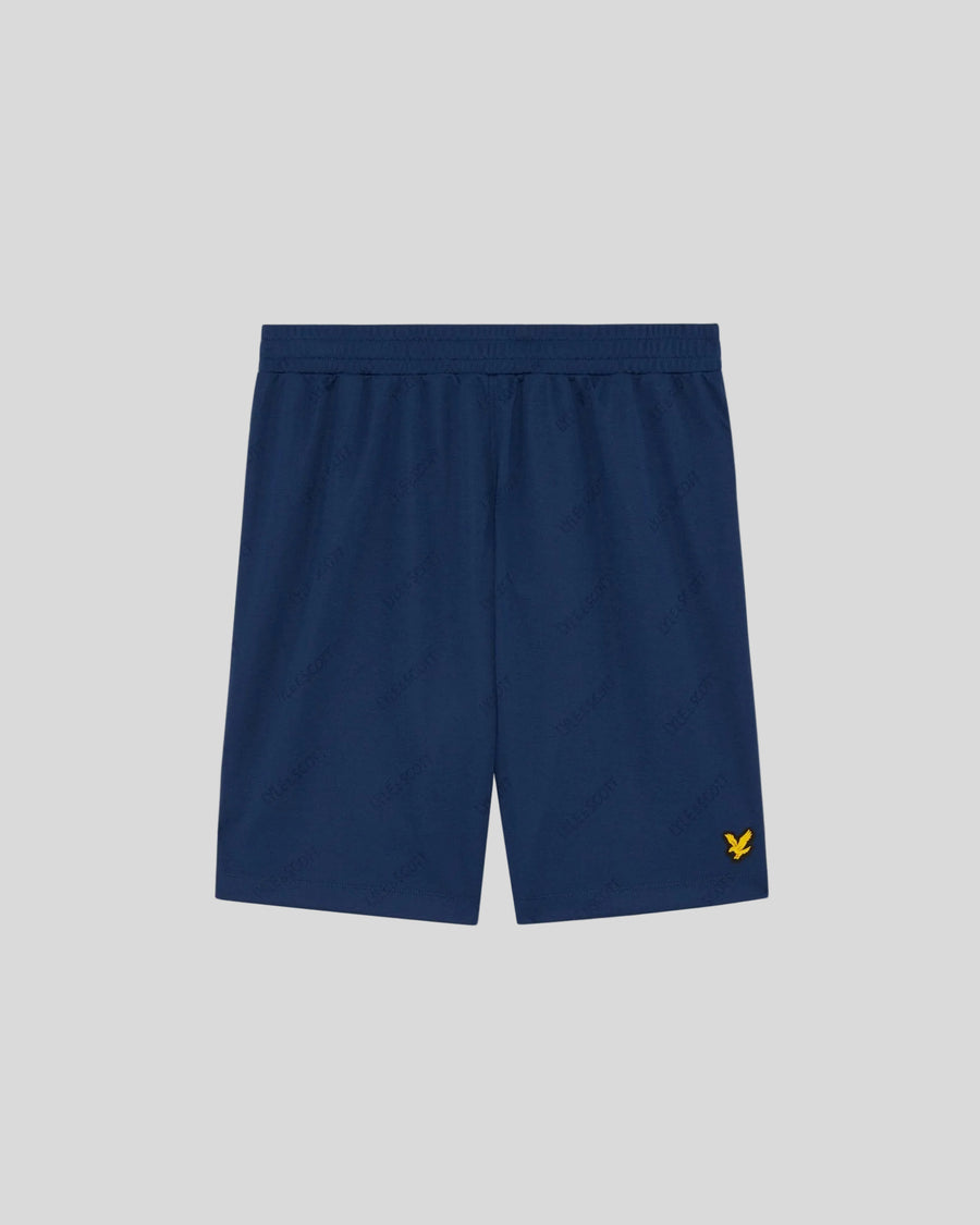 Pantalones cortos de fútbol con el logotipo en relieve, en color azul marino y rosa peonía