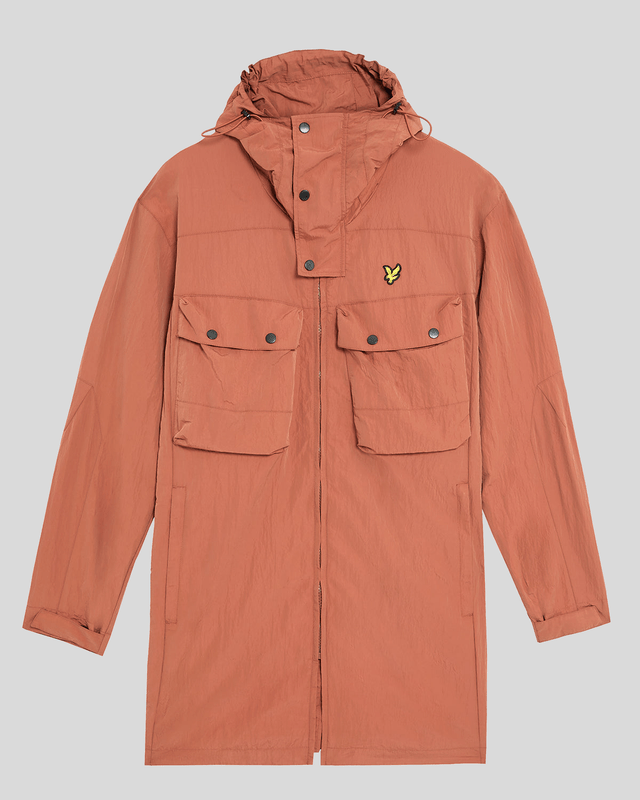 Man wears Water Resistant Guard Parka in Brick
